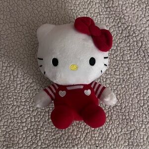hello kitty plush with red heart overalls